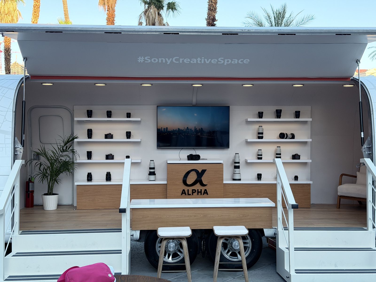 Live press station styled for Charlotte corporate conferences